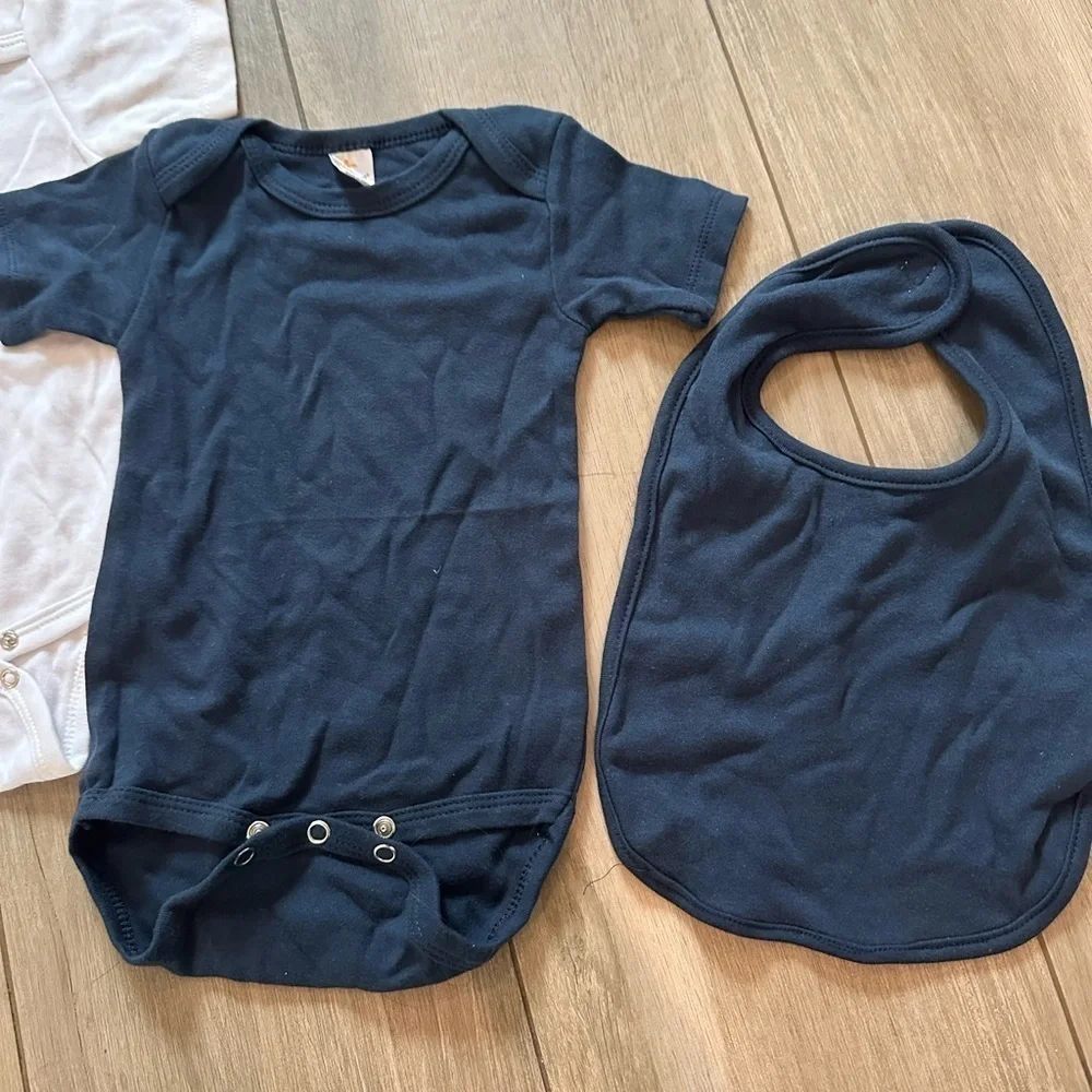 Bulk onesies and matching bib. Laughing giraffe and rabbit skins
